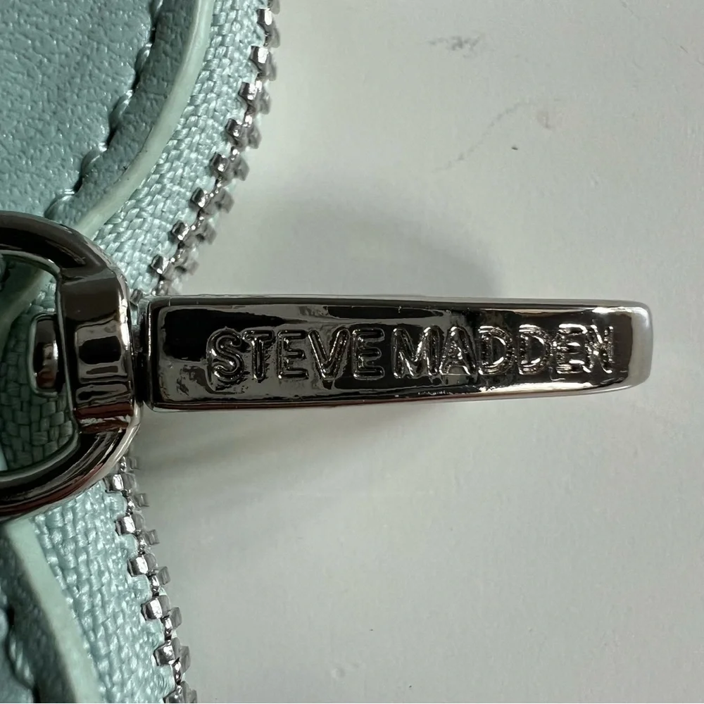 NWOT Steve Madden Frosty Green Coin Pouch. Plastic protector still on zipper tab